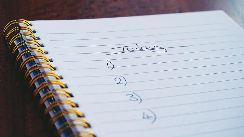 Notebook and pen on a bedside table