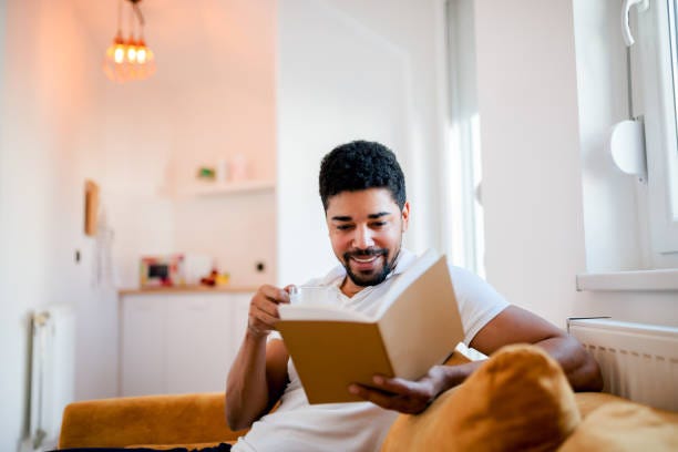 Books and writing materials symbolize the connection between reading and writing.